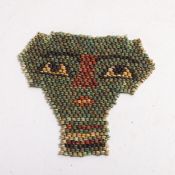 An Ancient Egyptian faience bead mummy mask, height 12cm