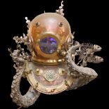 LEIGH DYER (born 1959) - a spectacular handmade stainless steel wall mount, designed to hold a