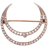 An Antique Victorian diamond crescent tiara centrepiece brooch, circa 1900, the openwork crescent
