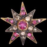 A sterling silver-gilt ruby and diamond starburst brooch/pendant, the 10-rayed star set with round-