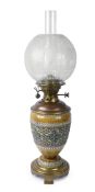 A late 19th century Doulton Lambeth brass mounted stoneware oil lamp
