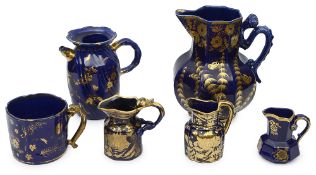 A collection of late Georgian Mason's Ironstone mazarine blue and gilt wares