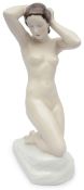 A Royal Dux Art Deco nude female figure designed by Rudolf Kaesbach