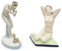 A Royal Dux Art Deco nude female figure and an a snake charmer
