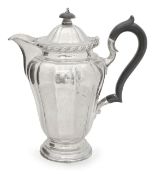 An Edward VII silver hot water jug