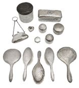 A collection of silver dressing table brushes, jars and others