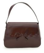 An Anya Hindmarch burgundy handbag with wallet