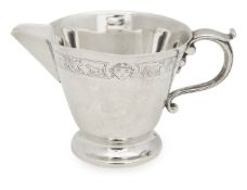 A George V silver milk jug