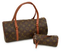 A Louis Vuitton 'Papillion' duffle and pochette