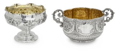 A Victorian silver sugar bowl with an Edwardian silver sugar bowl