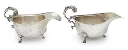 A pair of George VI silver sauceboats, in the George II style