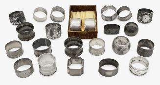 An assorted collection of silver napkin rings