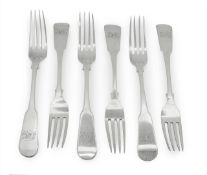 A set of six George III silver fiddle pattern table forks