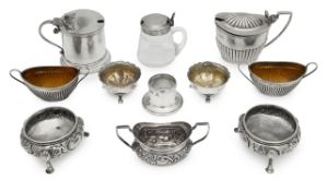A collection of nine silver salts and mustards etc.