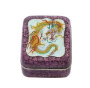 A silver enamelled box and cover