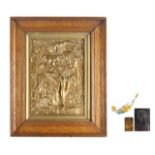 A collection four of gilt and relief decorated plaques