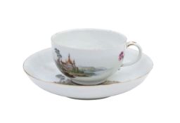 A Meissen porcelain teacup and saucer