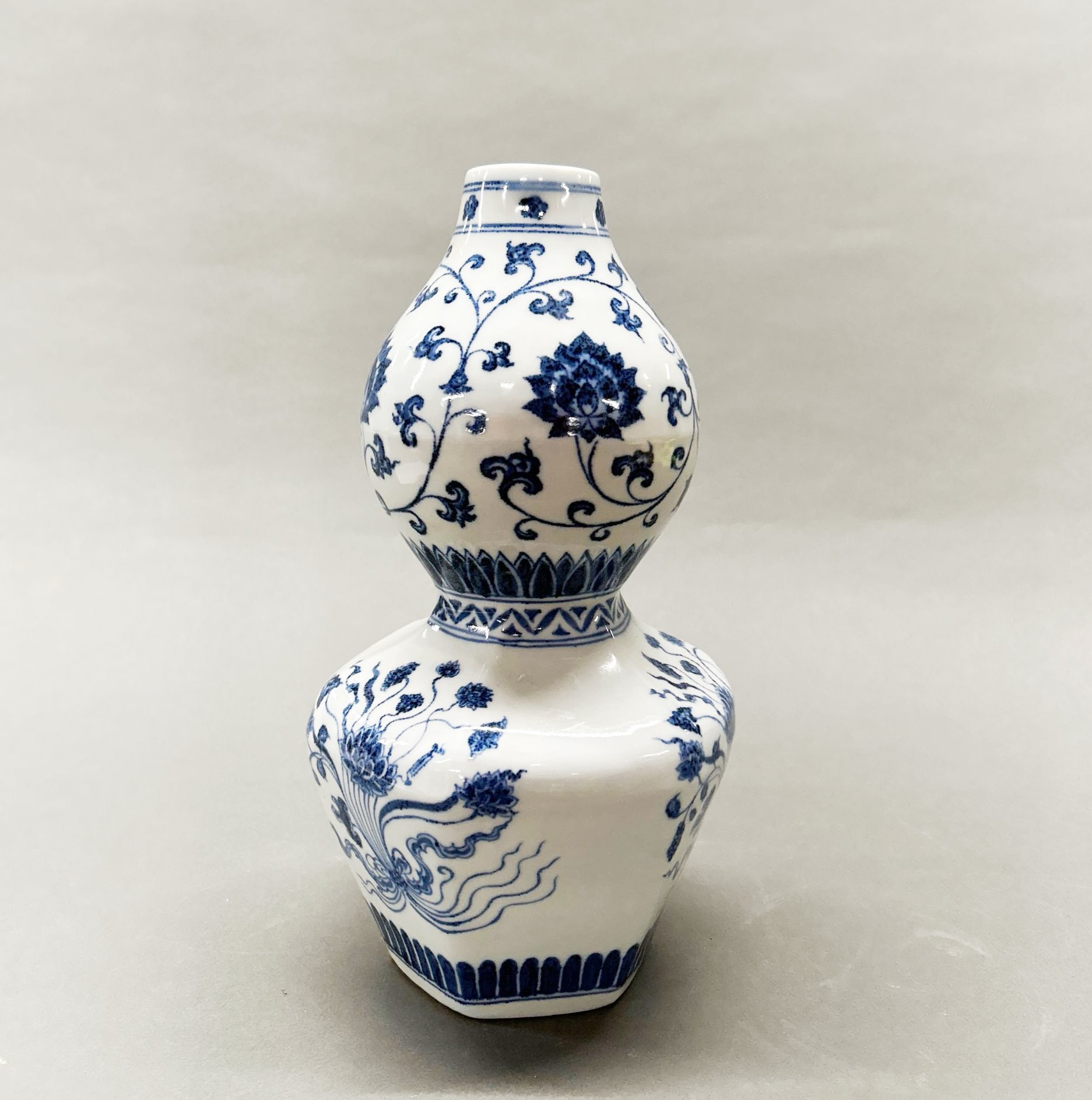 An interesting Chinese hand painted porcelain gourd shaped vase, H. 28cm.