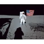 Apollo 14 Astronaut Ed Mitchell signed 10x8 inch colour photo standing by the flag on the moon 1971.