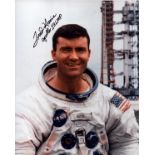 Apollo 13 Astronaut Fred Haise signed 10x8inch colour photo standing by the rocket 1970. From