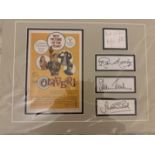 Oliver! Cast signed 14x11 display piece with the autographs of Mark Lester (Oliver), Ron Moody (