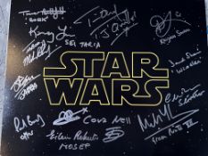 Star Wars THIRTEEN actors multi-signed 14x11 inch photo signed by Kamay Lau, Trevor Butterfield,
