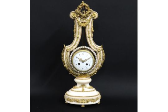 A 19thC. Louis XVI style ormolu mounted white marb