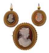 Cased Victorian unmarked yellow metal cameo brooch and pair of earrings