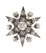 Early 20th century diamond yellow and white metal starburst pendant brooch