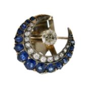 Early 20th century diamond and sapphire crescent form scarf clip
