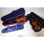 A Stentor student's violin in hard case, and a Theodore three quarter size violin in hard case