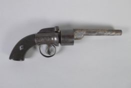A C19th British transitional six shot percussion cap revolver with an overhammer and octagonal