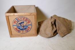 A vintage Players Navy Cut Tobacco crate, and a military canvas kit bag