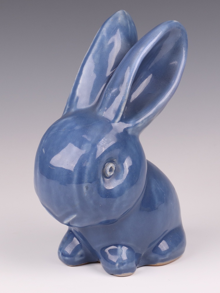 A Bourne Denby blue glazed figure of a seated rabbit 20cm