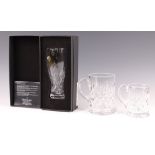A Waterford Crystal pint glass boxed, a cut glass pint tankard and a cut glass half pint tankard