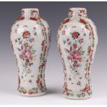 A pair of 19th Century Chinese famille rose export vases with rat, floral and vinous decoration 24cm