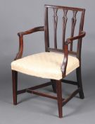 A 19th Century mahogany stick and rail back open arm desk/carver chair with overstuffed seat 88cm