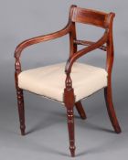 A 19th Century mahogany bar back open arm carver/desk chair, the seat upholstered in white leather