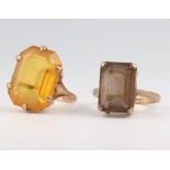 Two 9ct yellow gold gem set dress rings, size N, 10.3 grams gross