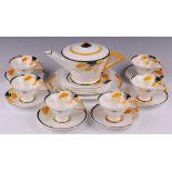 A Shelley, Art Deco Sunray pattern 23 piece tea service, bases marked 114Y2E, comprising teapot,