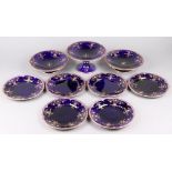 A Victorian 9 piece blue and gilt banded dessert service, the base marked 1686, comprising tall