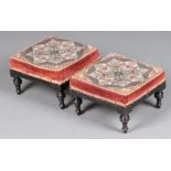 A pair of Victorian square ebonised footstools with bead work upholstered seats, raised on turned