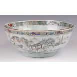 A Chinese circular Qianlong period porcelain bowl, the interior decorated a carp, the exterior