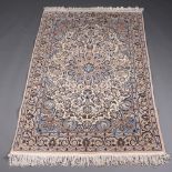 A white and blue ground North Persian rug with central medallion within a 3 row border 211cm x 125cm