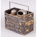 A 19th Century Japanese rectangular black lacquered writing box with carrying handles to the sides