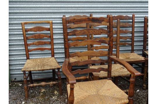 Thirteen assorted 19thC ash and rush seated ladderback dining chairs, to include three carvers, - Image 6 of 7