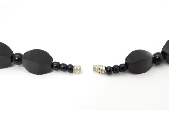 A vintage necklace of graduated black beads. Approx. 28" long Please Note - we do not make reference - Image 2 of 6