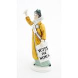 Suffragette Interest: A Royal Doulton Votes for Women figure, model no. HN2816. Approx. 9 3/4"