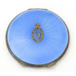 Militaria : a silver and guilloche enamel compact decorated with the insignia of the Royal Corps