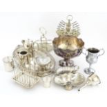 A quantity of silver plate items to include toast rack, egg cruet, trophy cup, pedestal bowl, butter